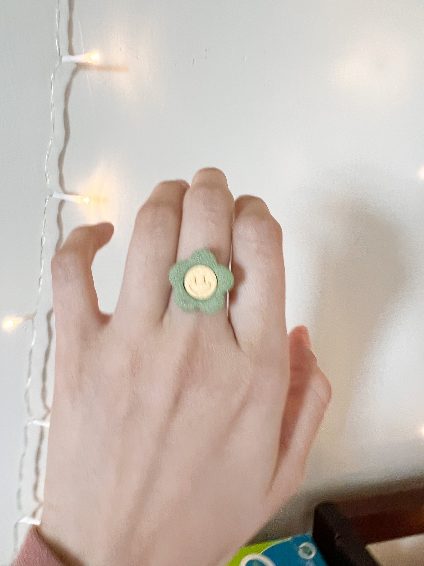 The Happy flower in sage green ring